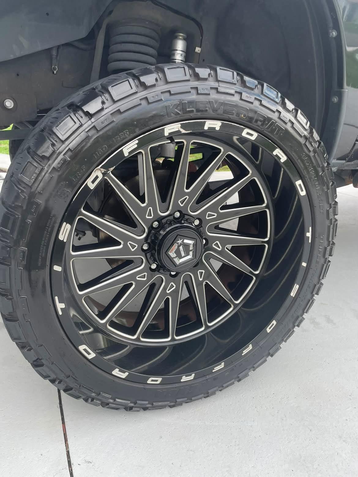 Cleaned rim and polished tire after detailing