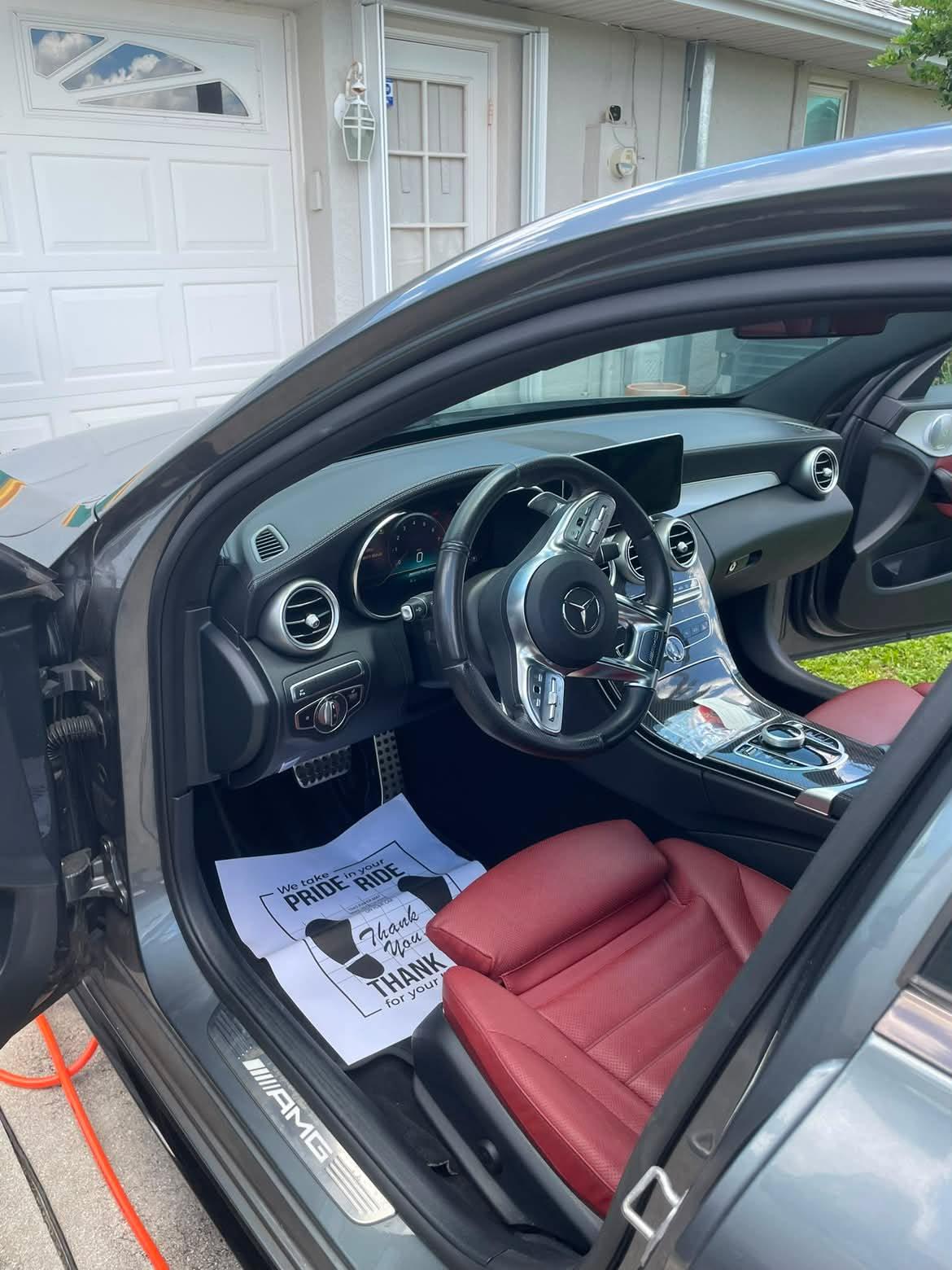 Car interior detailed with clean leather seats