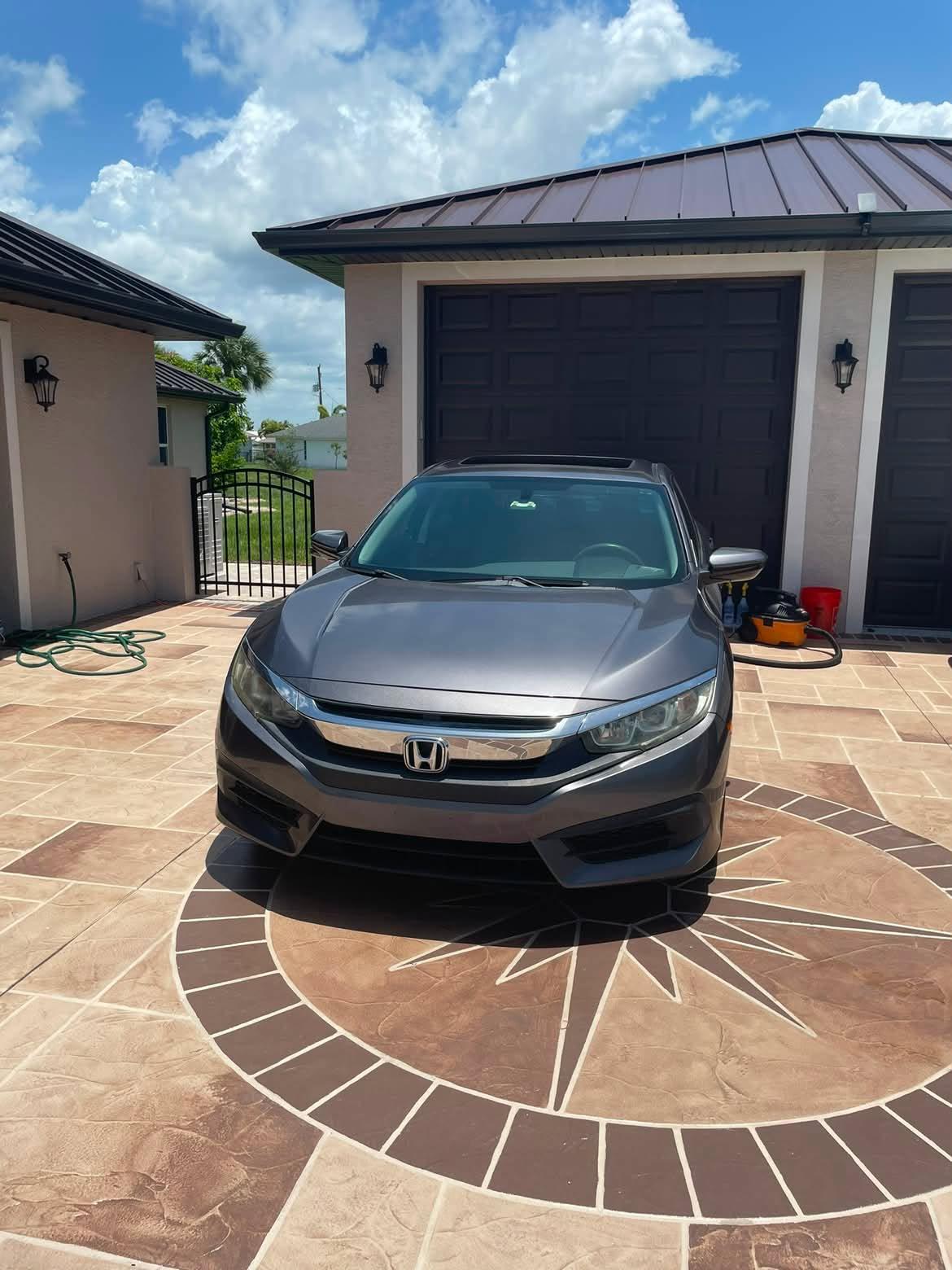 Freshly washed car after mobile exterior wash at home